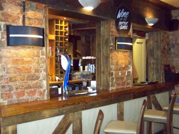 Imagen del bar/restaurante del Hotel Waterford Lodge. Foto 6