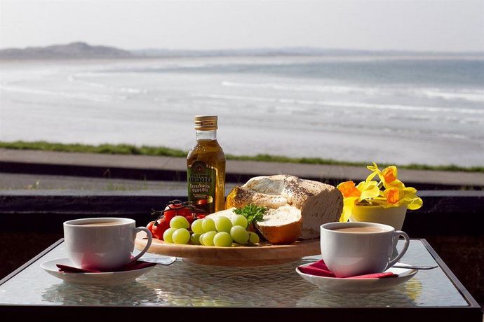 Imagen del bar/restaurante del Hotel Waterfront House. Foto 3