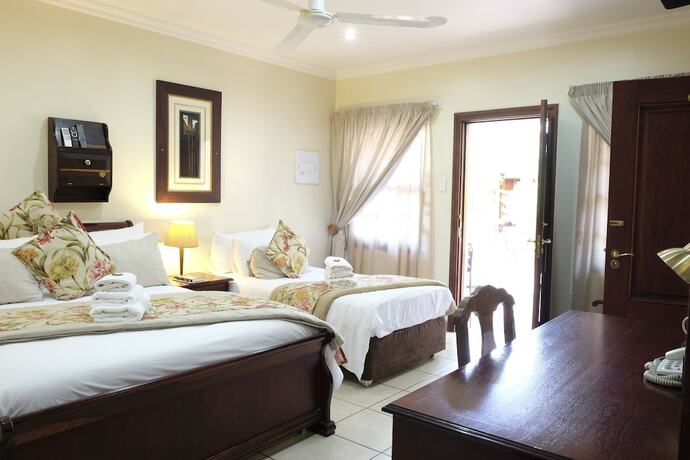 Imagen de la habitación del Hotel Waterkloof Guest House. Foto 15