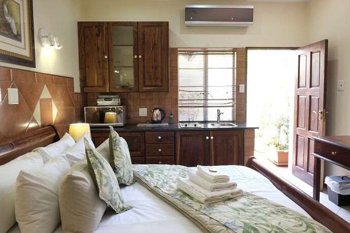 Imagen de la habitación del Hotel Waterkloof Guest House. Foto 20