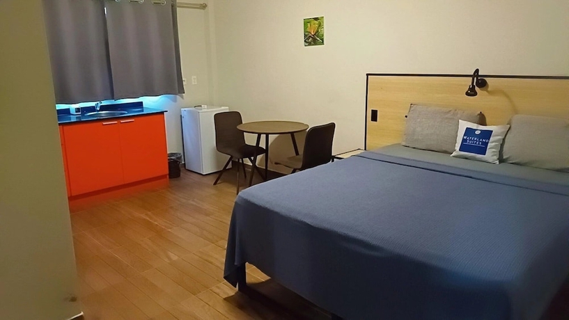 Imagen de la habitación del Hotel Waterland Suites. Foto 7