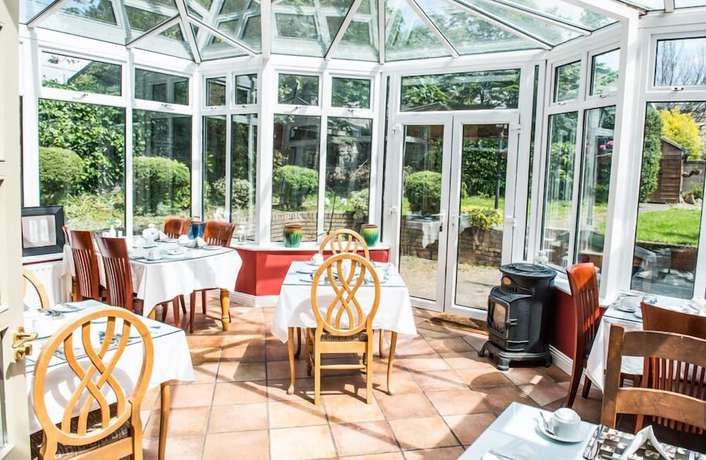 Imagen del bar/restaurante del Hotel Waterloo Townhouse and Suites. Foto 3