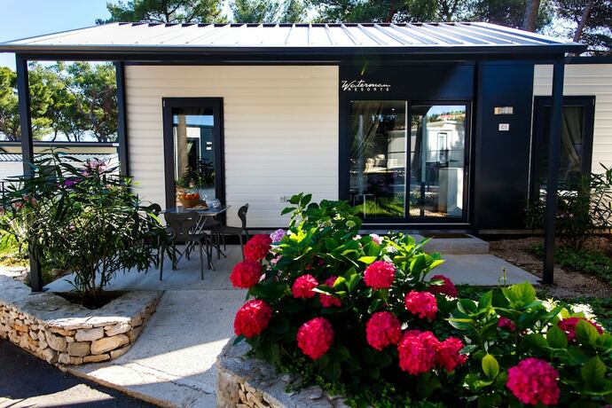 Imagen de la habitación del Hotel Waterman Beach Village. Foto 19