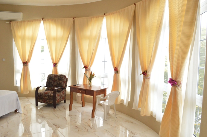 Imagen de la habitación del Hotel Waters Edge Guest House. Foto 13