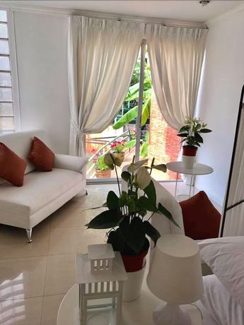 Imagen de la habitación del Hotel Waterside Boutique Hotel. Foto 9