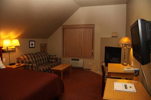 Imagen de la habitación del Hotel Waterton Lakes Lodge Resort. Foto 12