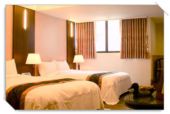 Imagen de la habitación del Hotel Waugh Den. Foto 13