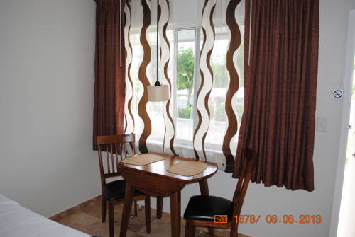 Imagen de la habitación del Hotel Wave Beach Vacation Rentals. Foto 2
