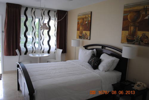 Imagen de la habitación del Hotel Wave Beach Vacation Rentals. Foto 12