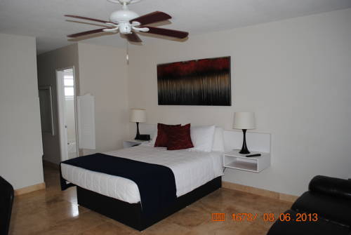 Imagen de la habitación del Hotel Wave Beach Vacation Rentals. Foto 13