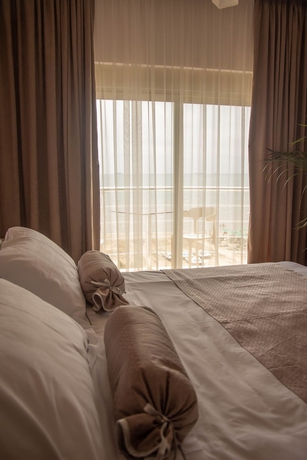 Imagen de la habitación del Hotel Wave Beachfront Apartments. Foto 5
