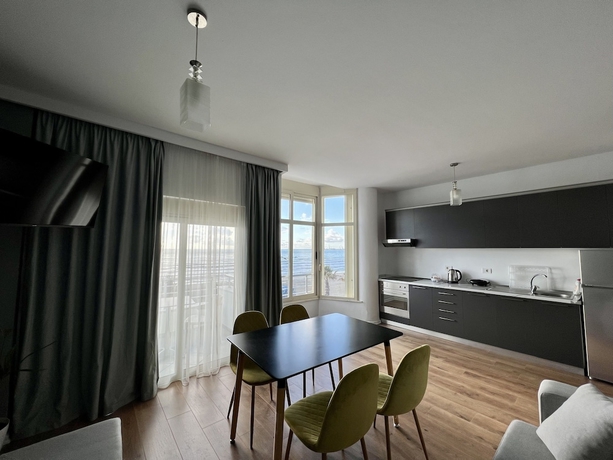 Imagen de la habitación del Hotel Wave Beachfront Apartments. Foto 6