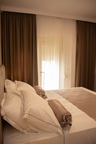 Imagen de la habitación del Hotel Wave Beachfront Apartments. Foto 10