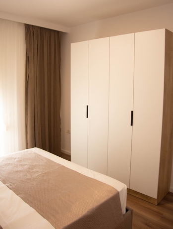 Imagen de la habitación del Hotel Wave Beachfront Apartments. Foto 11