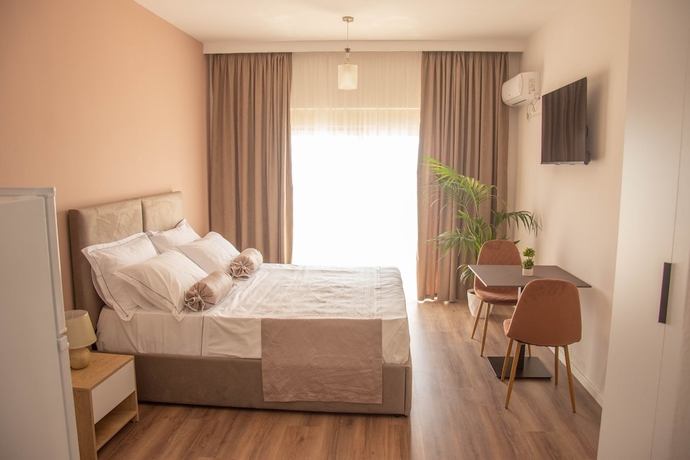 Imagen de la habitación del Hotel Wave Beachfront Apartments. Foto 12