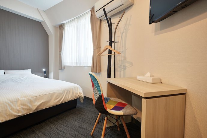 Imagen de la habitación del Hotel Wave, Naha. Foto 2