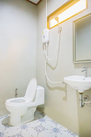 Imagen de la habitación del Hotel Wave-f Homestay. Foto 19
