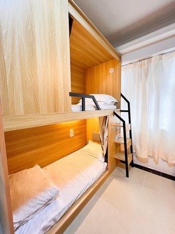 Imagen de la habitación del Hotel Waveflo Hostel. Foto 3