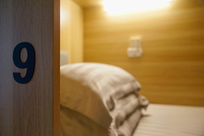 Imagen de la habitación del Hotel Waveflo Hostel. Foto 11