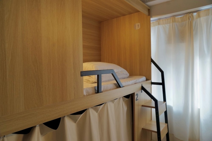 Imagen de la habitación del Hotel Waveflo Hostel. Foto 15