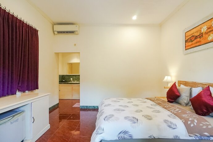 Imagen de la habitación del Hotel Wayan Homestay Sanur. Foto 18