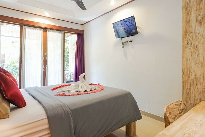 Imagen de la habitación del Hotel Wayan Homestay Sanur. Foto 20