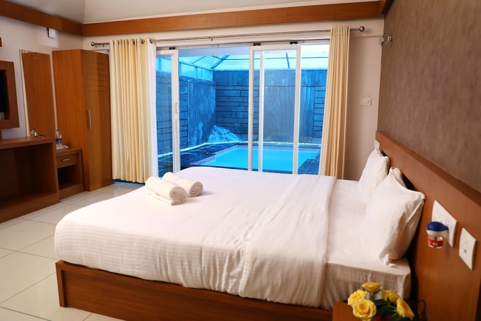 Imagen de la habitación del Hotel Wayanad Ranches Resorts. Foto 9
