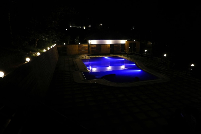 Imagen de la piscina del Hotel Wayanad Ranches Resorts. Foto 19