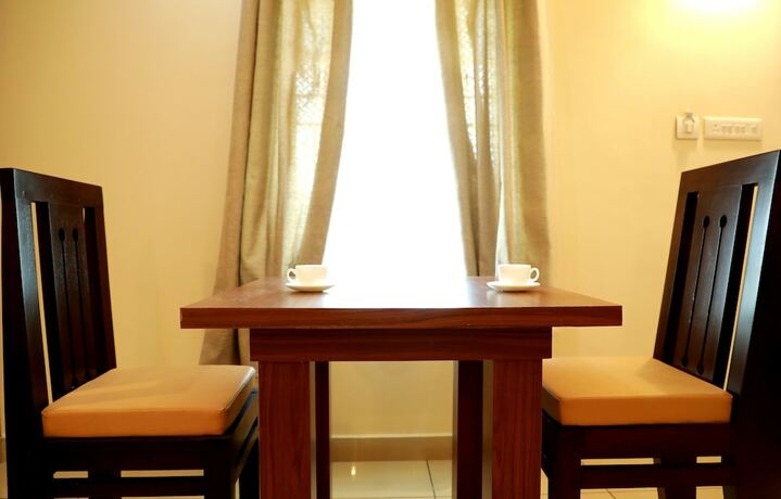 Imagen de la habitación del Hotel Wayanad Royal Crown. Foto 18