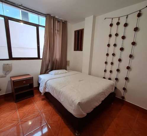 Imagen de la habitación del Hotel Waynama Hostal. Foto 8