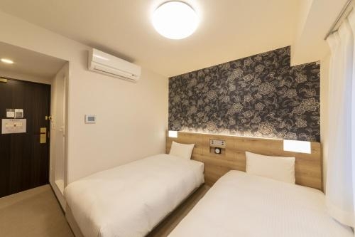 Imagen de la habitación del Hotel Wbf Namba Nippombashi. Foto 7