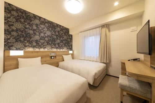 Imagen de la habitación del Hotel Wbf Namba Nippombashi. Foto 9