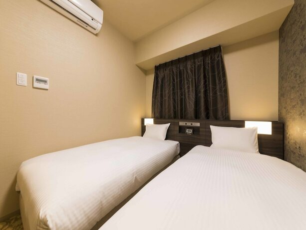 Imagen de la habitación del Hotel Wbf Shinsaibashi. Foto 2