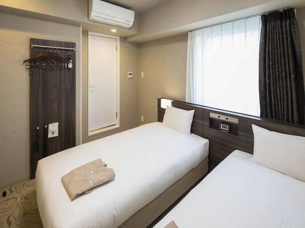 Imagen de la habitación del Hotel Wbf Shinsaibashi. Foto 3