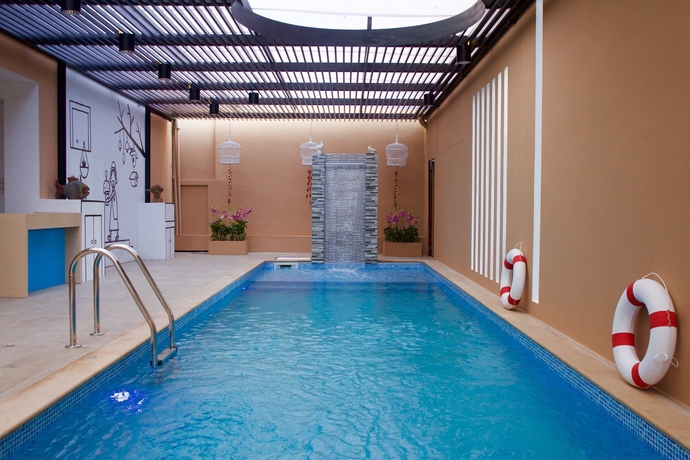 Imagen de la piscina del Hotel We Briza Chiang Mai. Foto 18