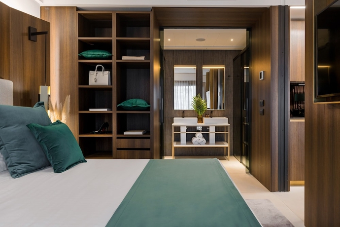 Imagen de la habitación del Hotel We Me Suite. Foto 7