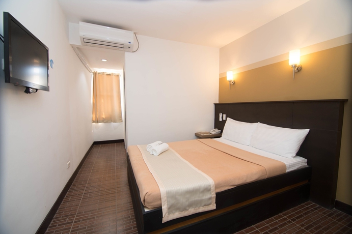 Imagen de la habitación del Hotel We Travelers Inn. Foto 2