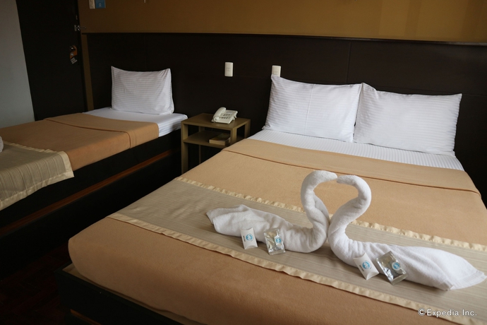 Imagen de la habitación del Hotel We Travelers Inn. Foto 4