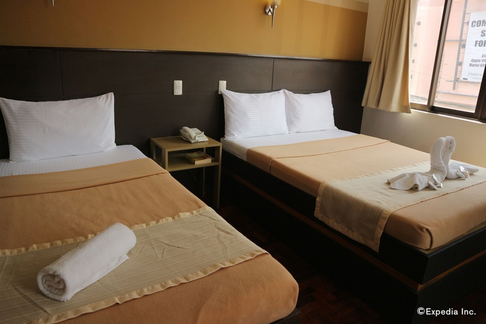 Imagen de la habitación del Hotel We Travelers Inn. Foto 5