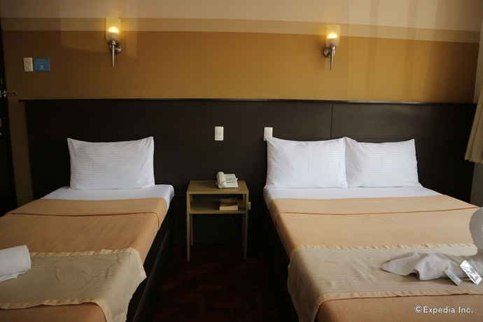 Imagen de la habitación del Hotel We Travelers Inn. Foto 6