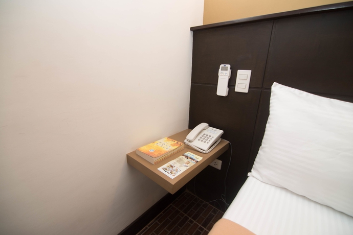 Imagen de la habitación del Hotel We Travelers Inn. Foto 8