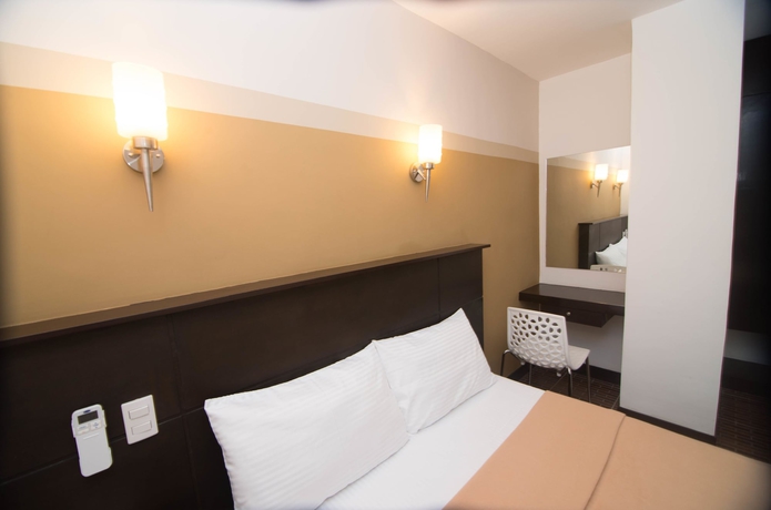 Imagen de la habitación del Hotel We Travelers Inn. Foto 11