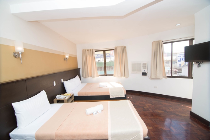 Imagen de la habitación del Hotel We Travelers Inn. Foto 13