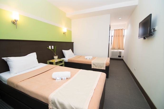 Imagen de la habitación del Hotel We Travelers Inn. Foto 14