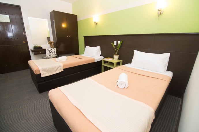 Imagen de la habitación del Hotel We Travelers Inn. Foto 15