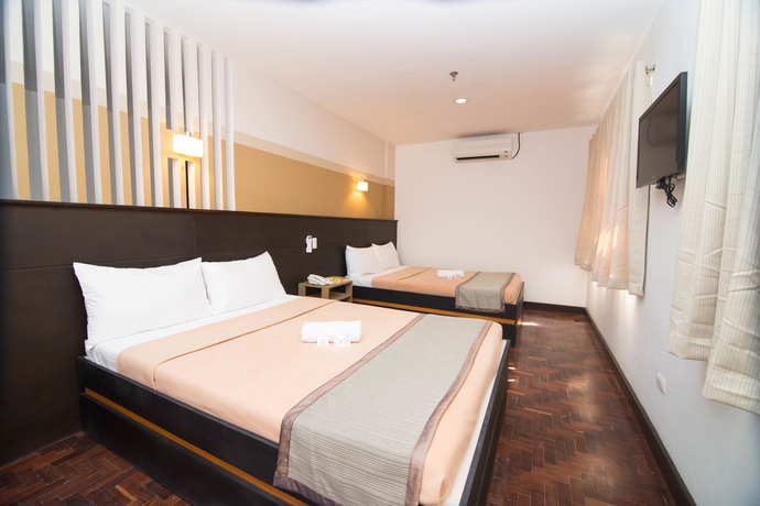 Imagen de la habitación del Hotel We Travelers Inn. Foto 17