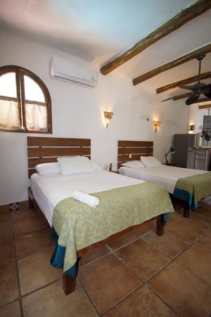 Imagen de la habitación del Hotel We Uniq Tulum. Foto 6