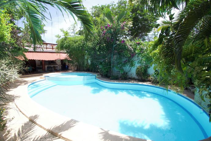 Imagen de la piscina del Hotel We Uniq Tulum. Foto 14