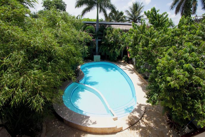 Imagen de la piscina del Hotel We Uniq Tulum. Foto 15