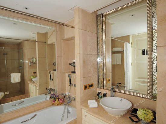 Imagen de la habitación del Hotel Wealthy All Suite. Foto 3